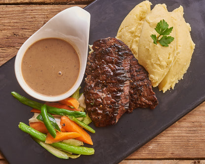 Grilled Steak with Mashed Potatoes and Vegetables